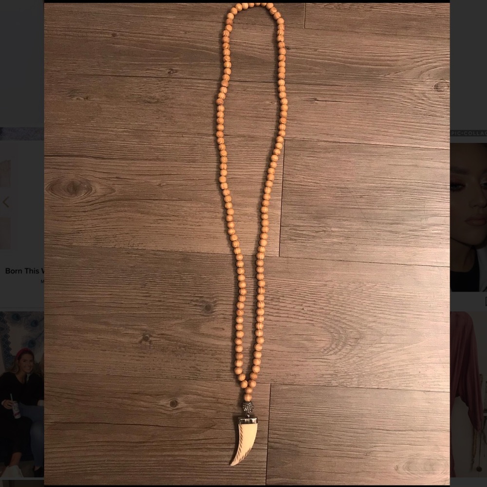 Wood beaded necklace with horn
